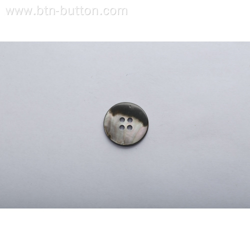 Four-hole buttons made of shells